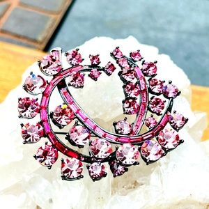 Sparkling pink brooch.